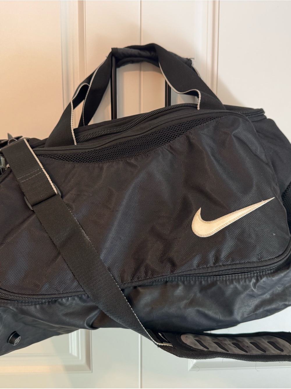 Nike Black Duffel Bag with White Swoosh Accent